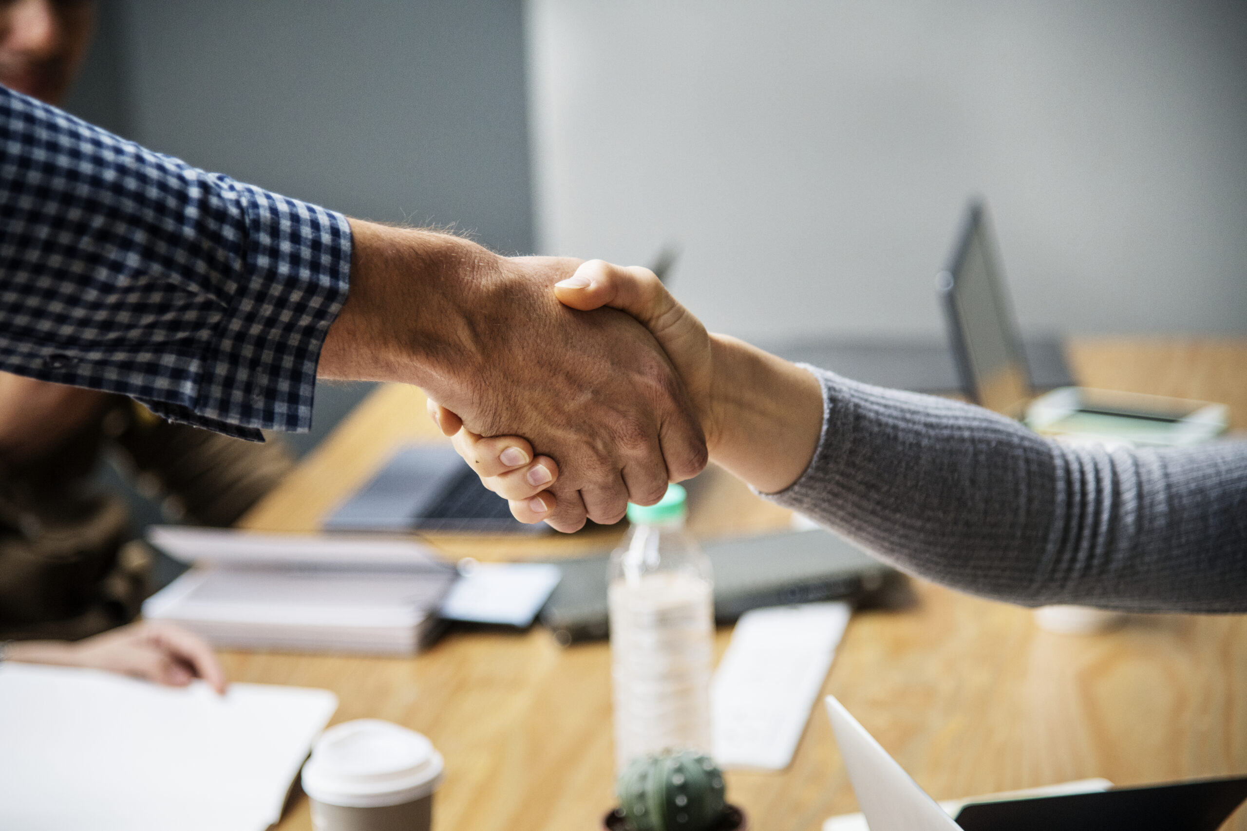 Shaking hands with attorney.