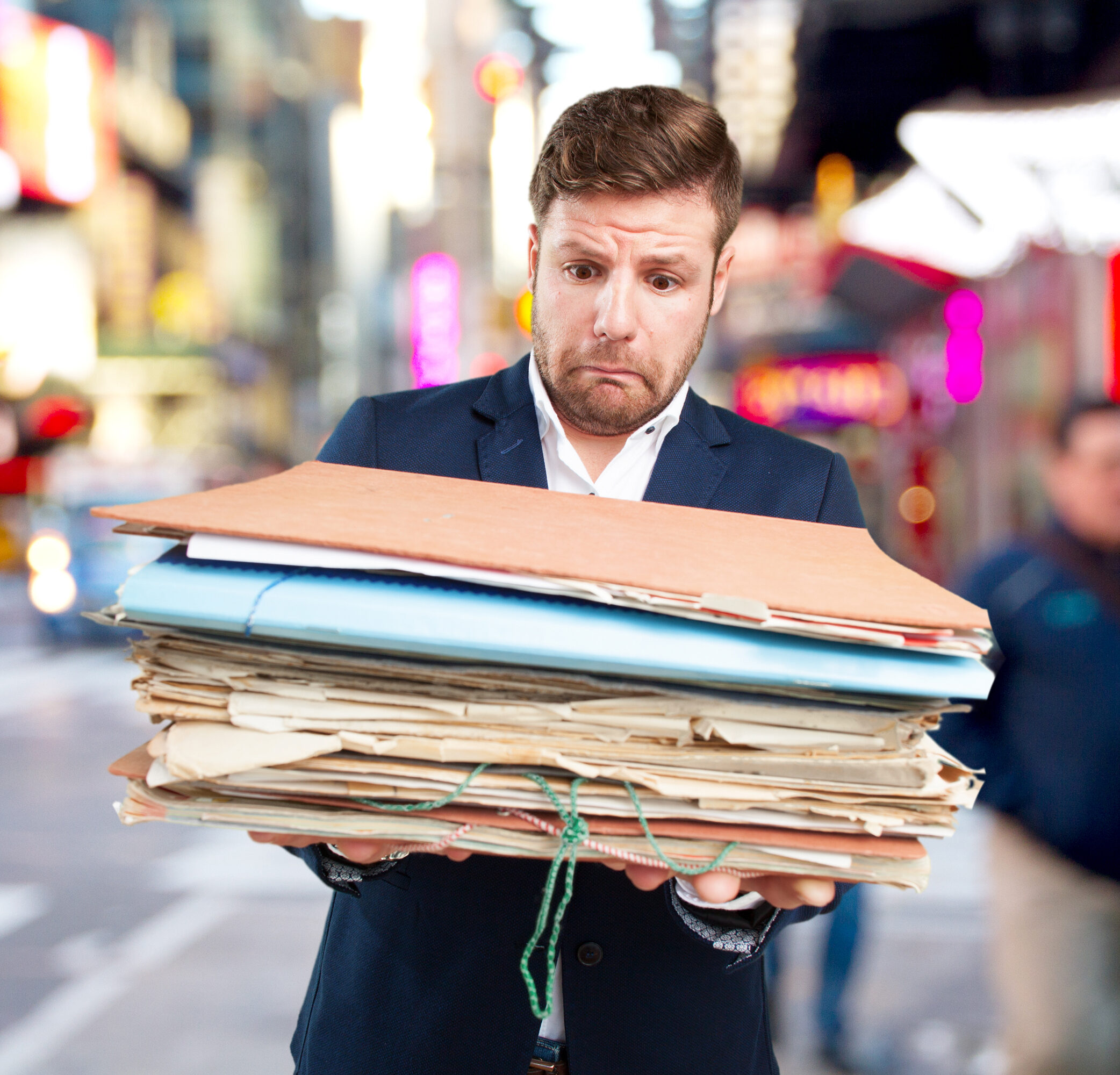 Man holding documents.