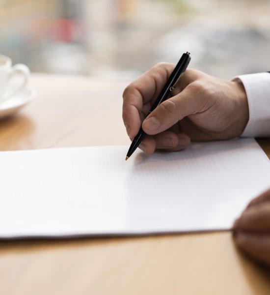 Missouri Probate Lawyer signing paperwork.